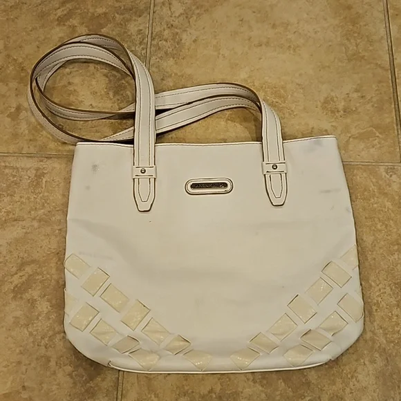 jaclyn smith purse may be a little dirty